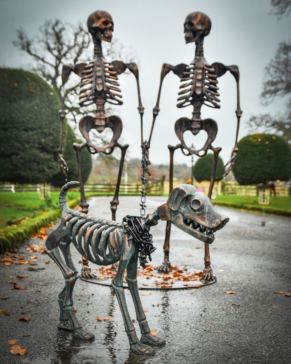 “Bones” the loyal Skeleton Dog Sculpture with owners