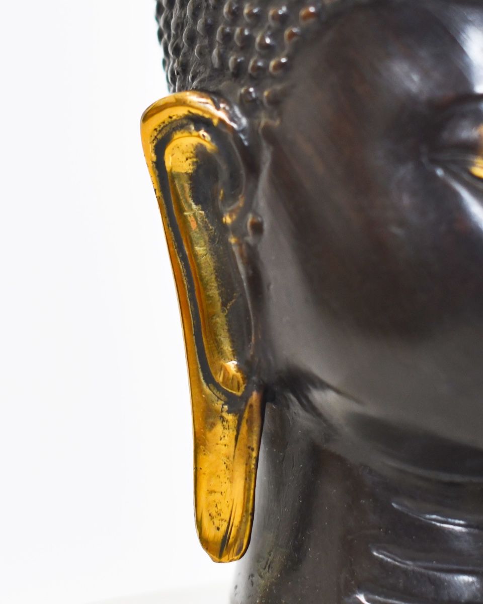 "Boundless Breath" Cast Brass Ornament close up of ear