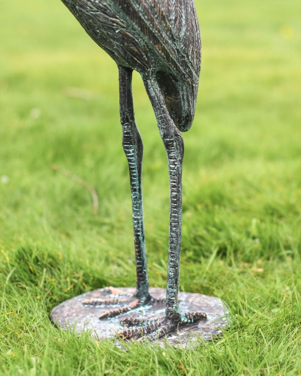 "Caspian" the Heron Cast Aluminium Garden Sculpture on a Garden Lawn Close up of the Legs