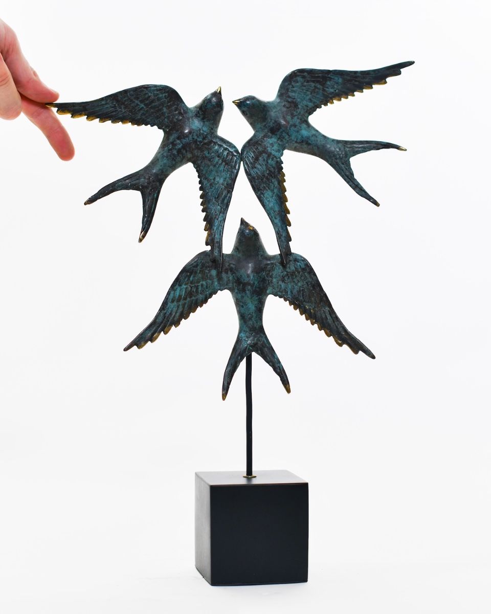 "Celestial Ascent" Cast Brass Sculpture with hand in shot for scale