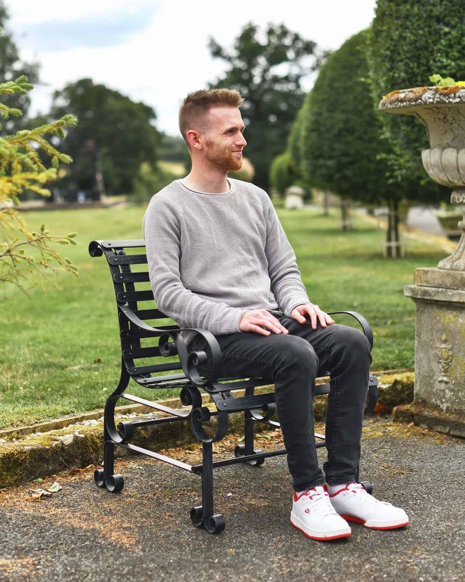 Scale Shot of Black “Chatham" One Seater Park Bench