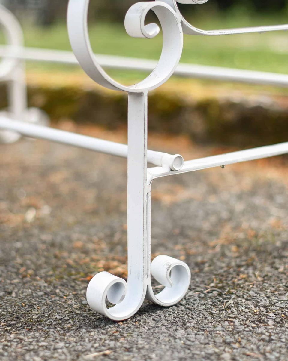 Close-Up of Integral Legs on Cream “Chatham" Two Seater Park Bench
