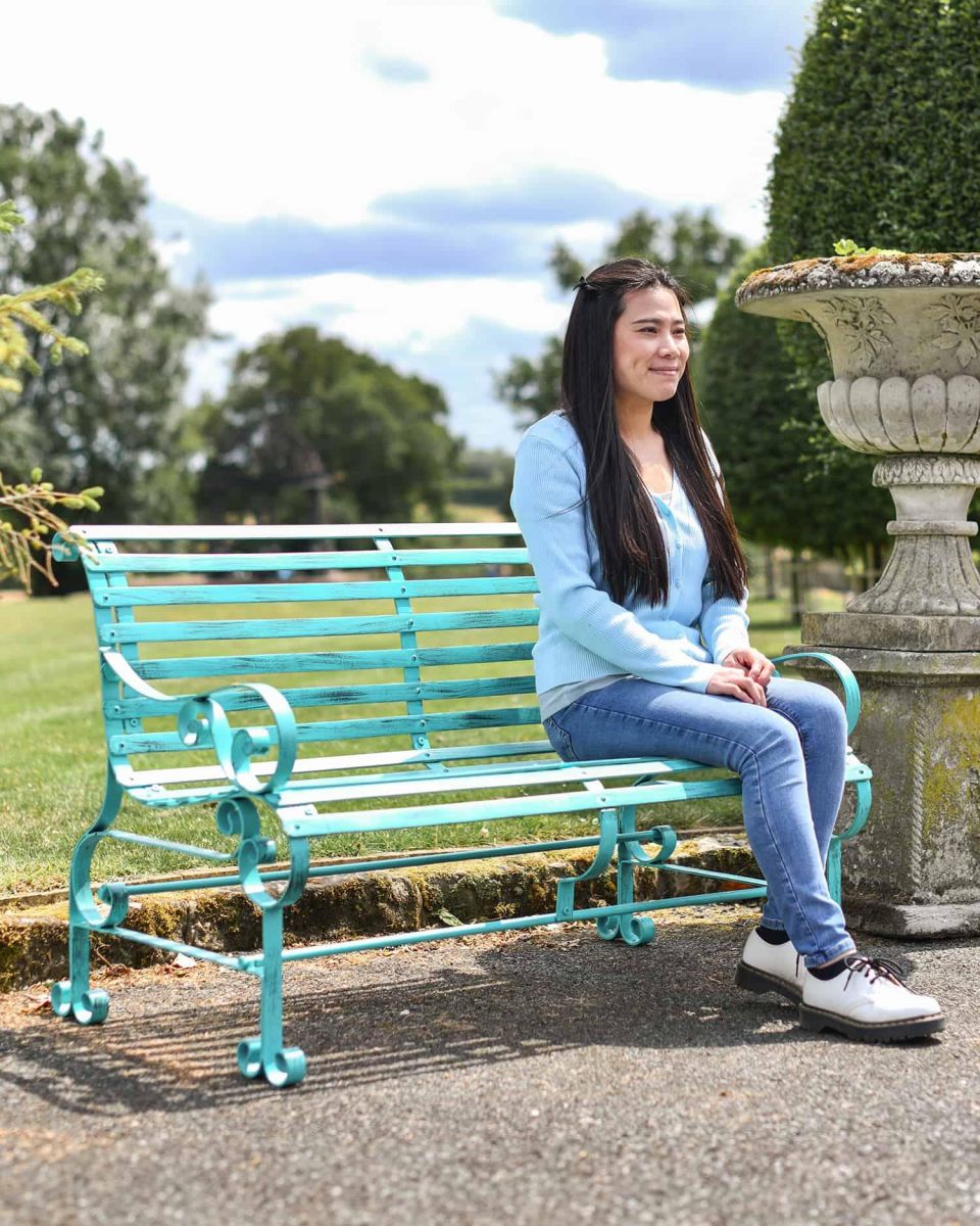 Scale Shot of Green “Chatham" Two Seater Park Bench