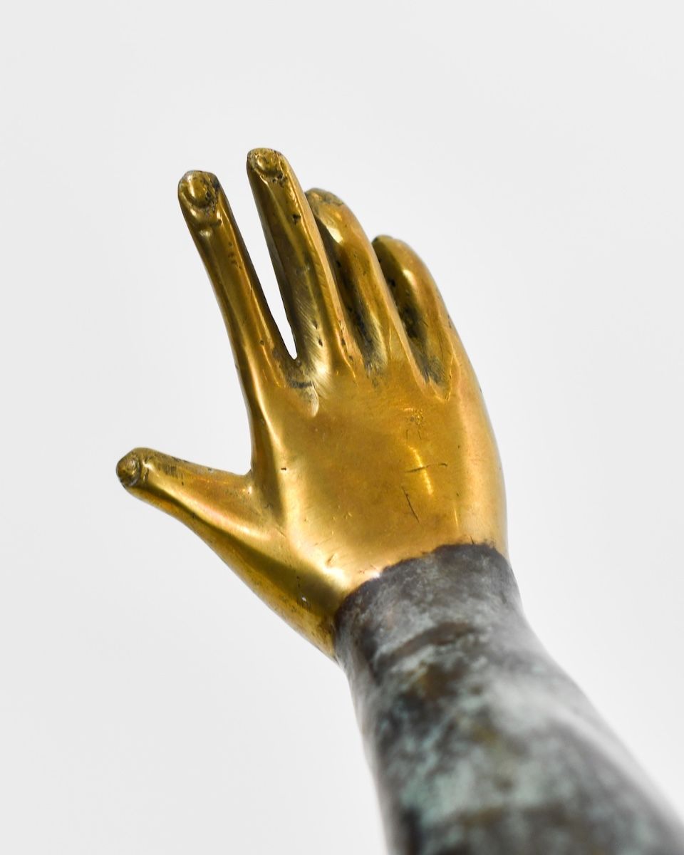 "Continuum" Cast Brass Home Sculpture close up of hand