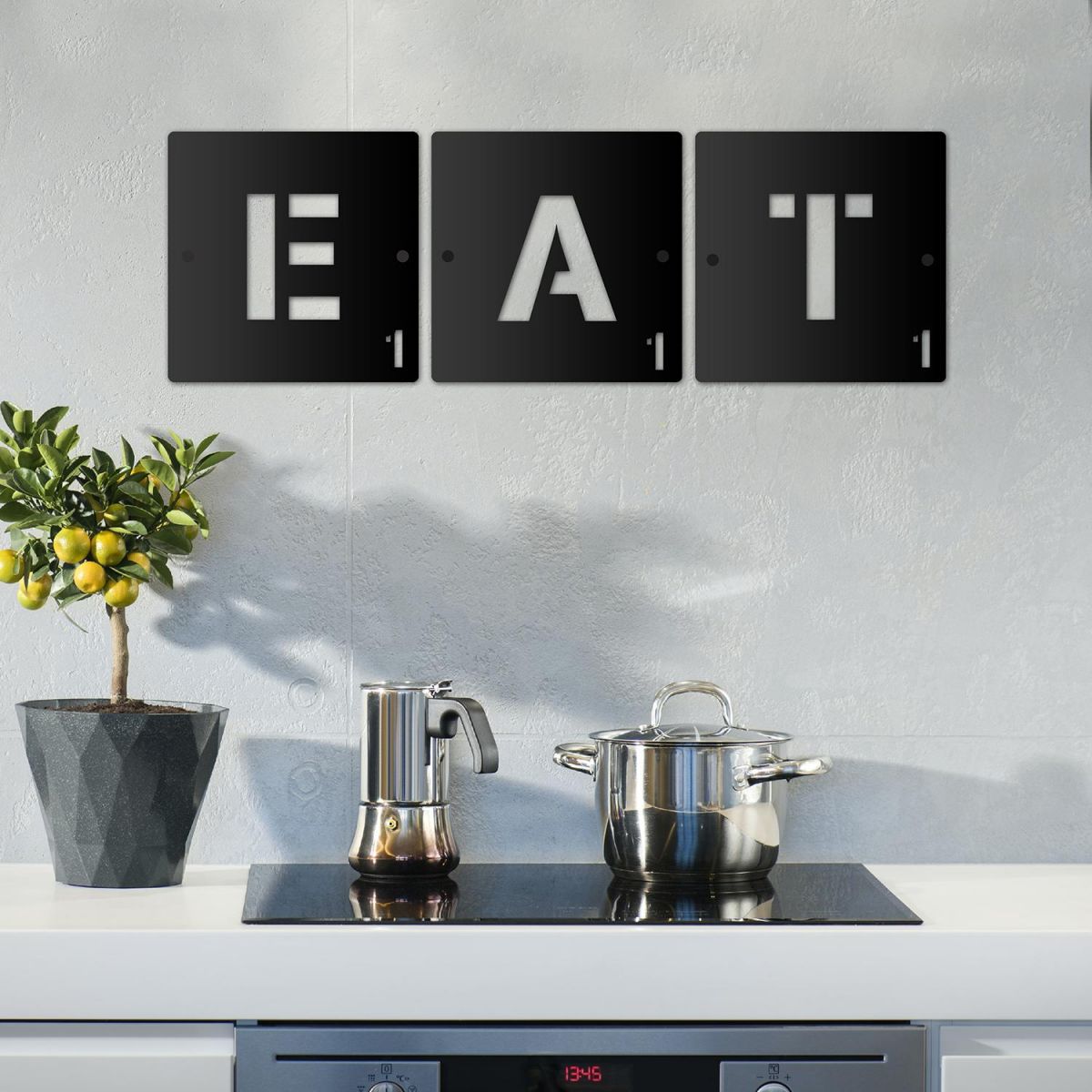 "EAT" Black Scrabble Square Letters in Use in the Kitchen
