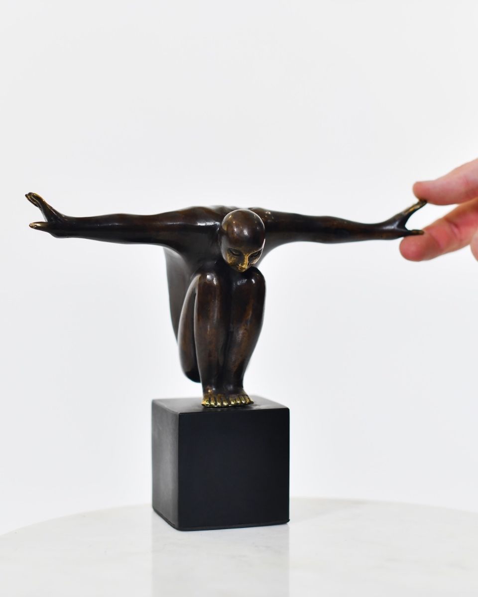 "Equilibrium" Cast Brass Interior Sculpture with hand in shot for scale