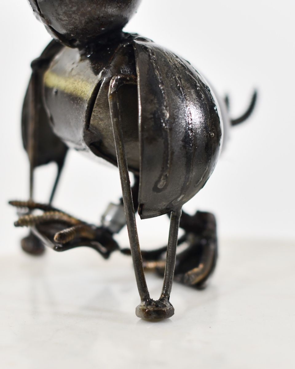 "Flap" Injured Duck Scrap Metal Sculpture close up of crutches