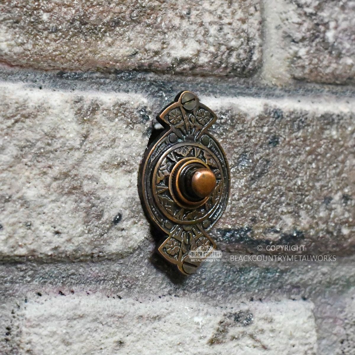 “Hampern Close” Antique Copper Decorative Bell Push Fitted On Brick Wall