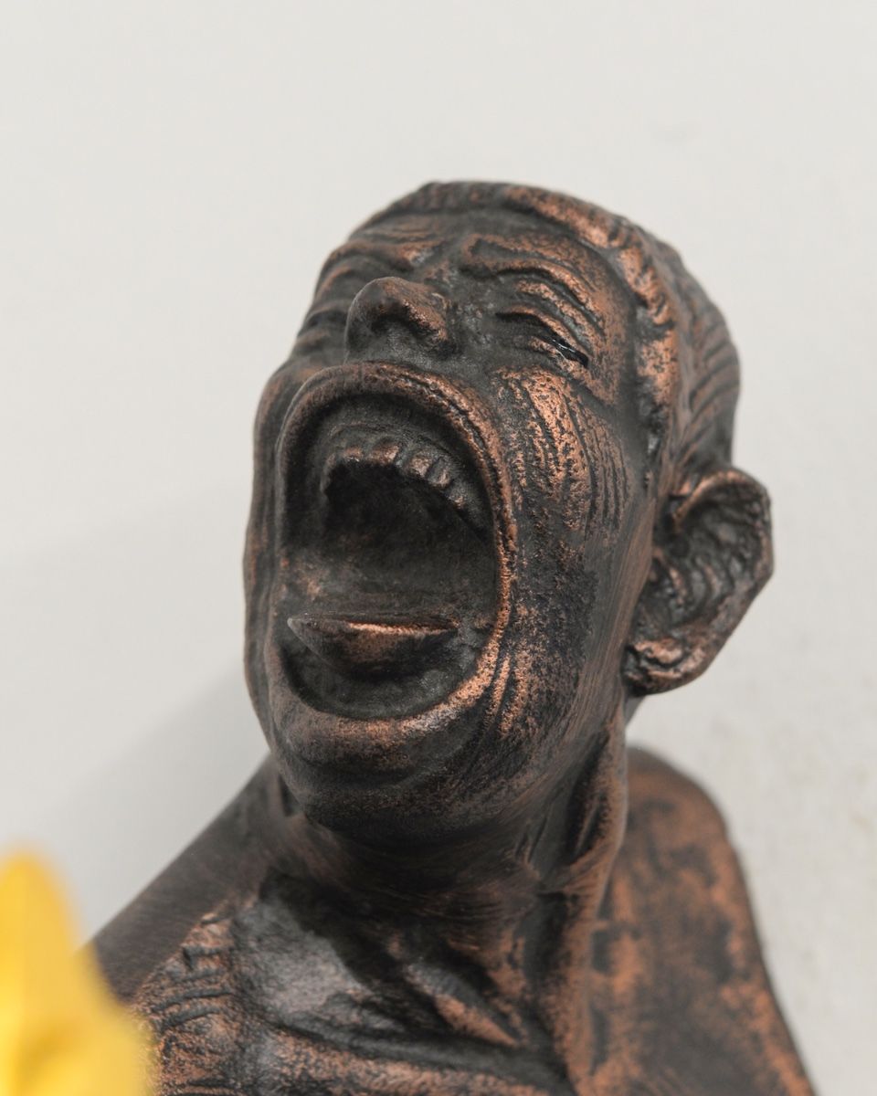 "Ignite" Cast Aluminium Wall Art in Bronze and Copper Finish close up of mouth