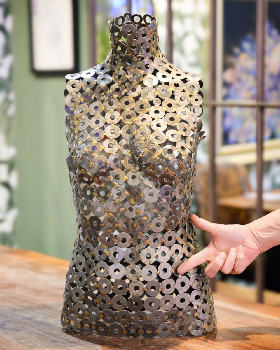 "Juno" Female Torso Reclaimed Metal Sculpture - 62cm with hand in shot for scale 