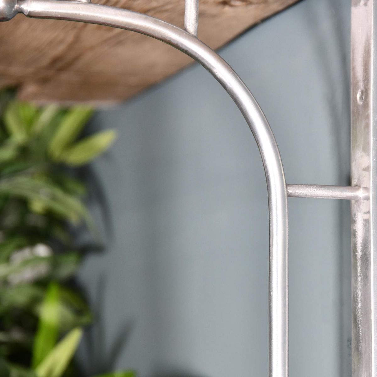 Close-up of the Polished Aluminium Finish on the ’Kepler’ Modern Wall Bracket