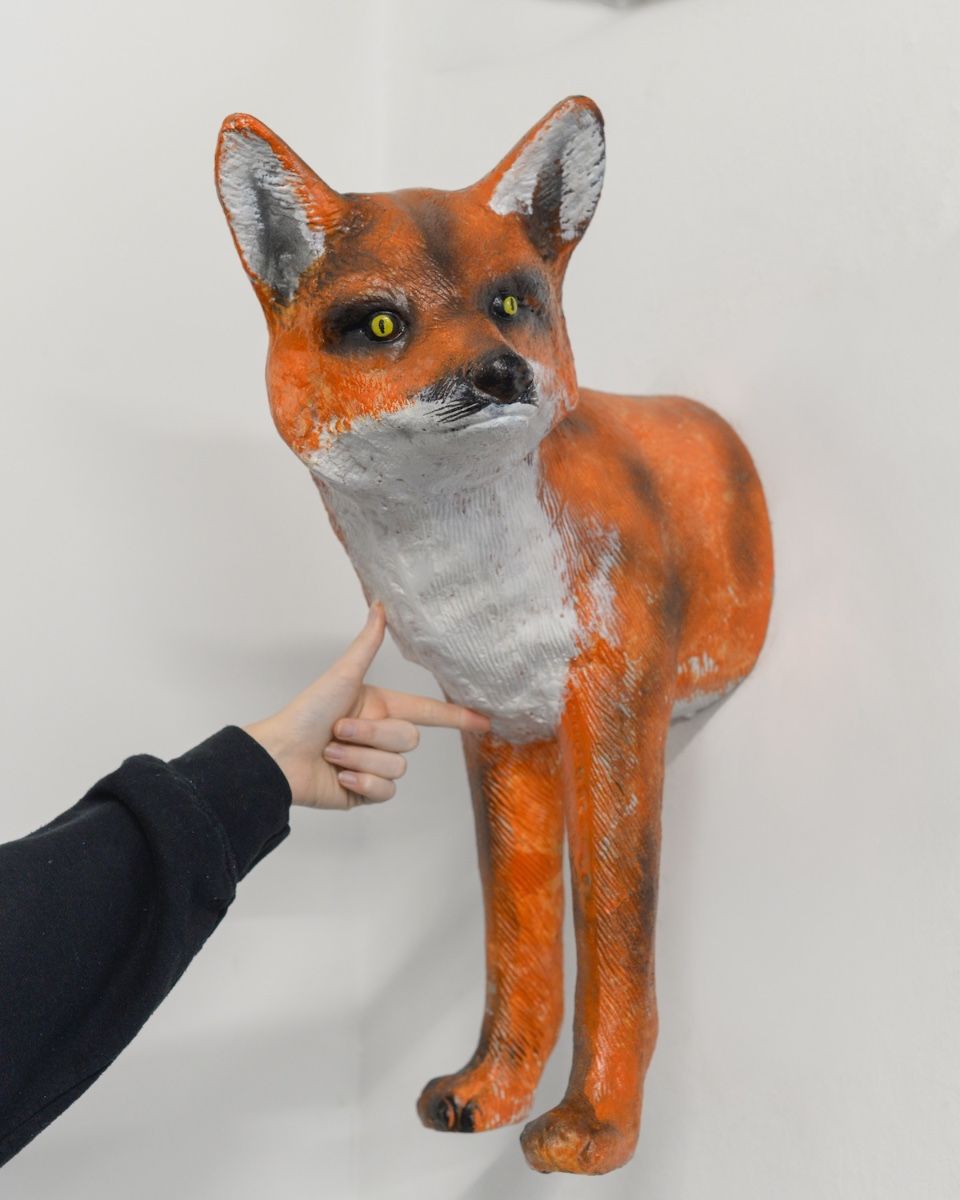 "Kit" the Red Fox Cast Aluminium Wall Art with hand in shot for scale