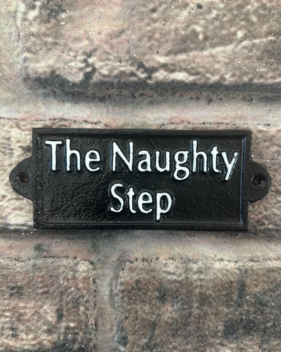 "Naughty Step" Traditional Cast Iron Wall Sign black and white close up