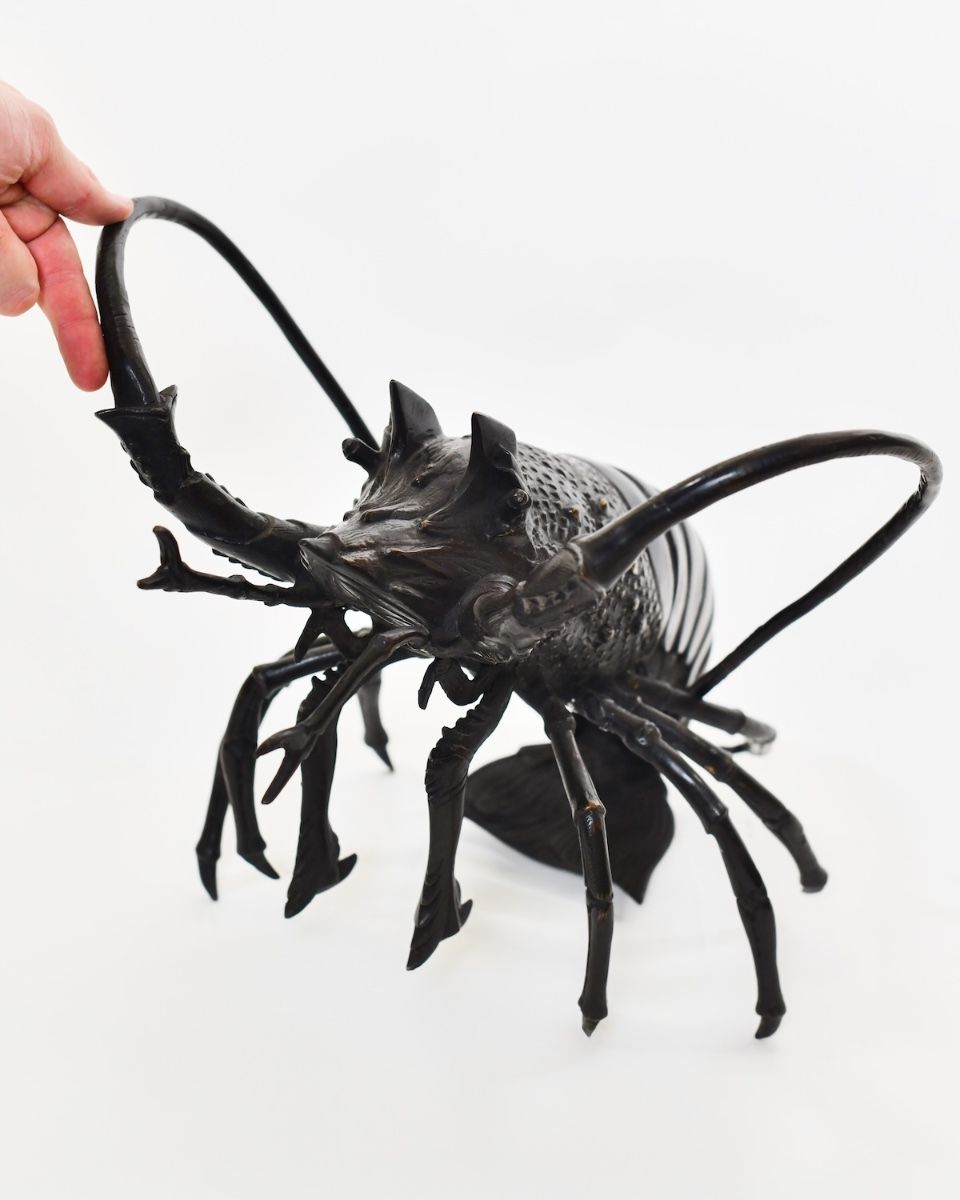 "Nocturne" Lobster Sculpture in Cast Brass with hand in shot for scale