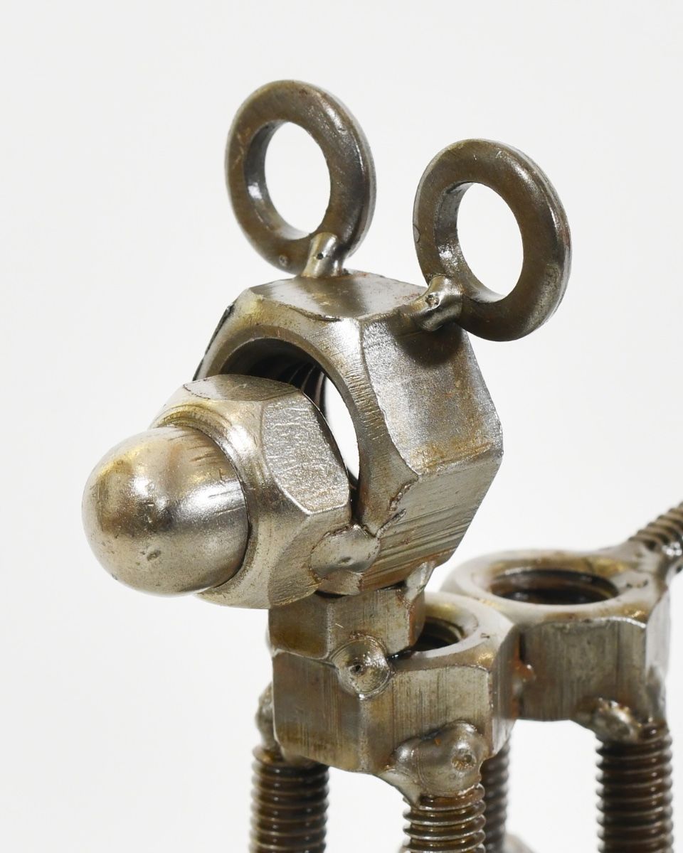 "Nuts" Standing Puppy Upcycled Metal Home Ornament close up of head