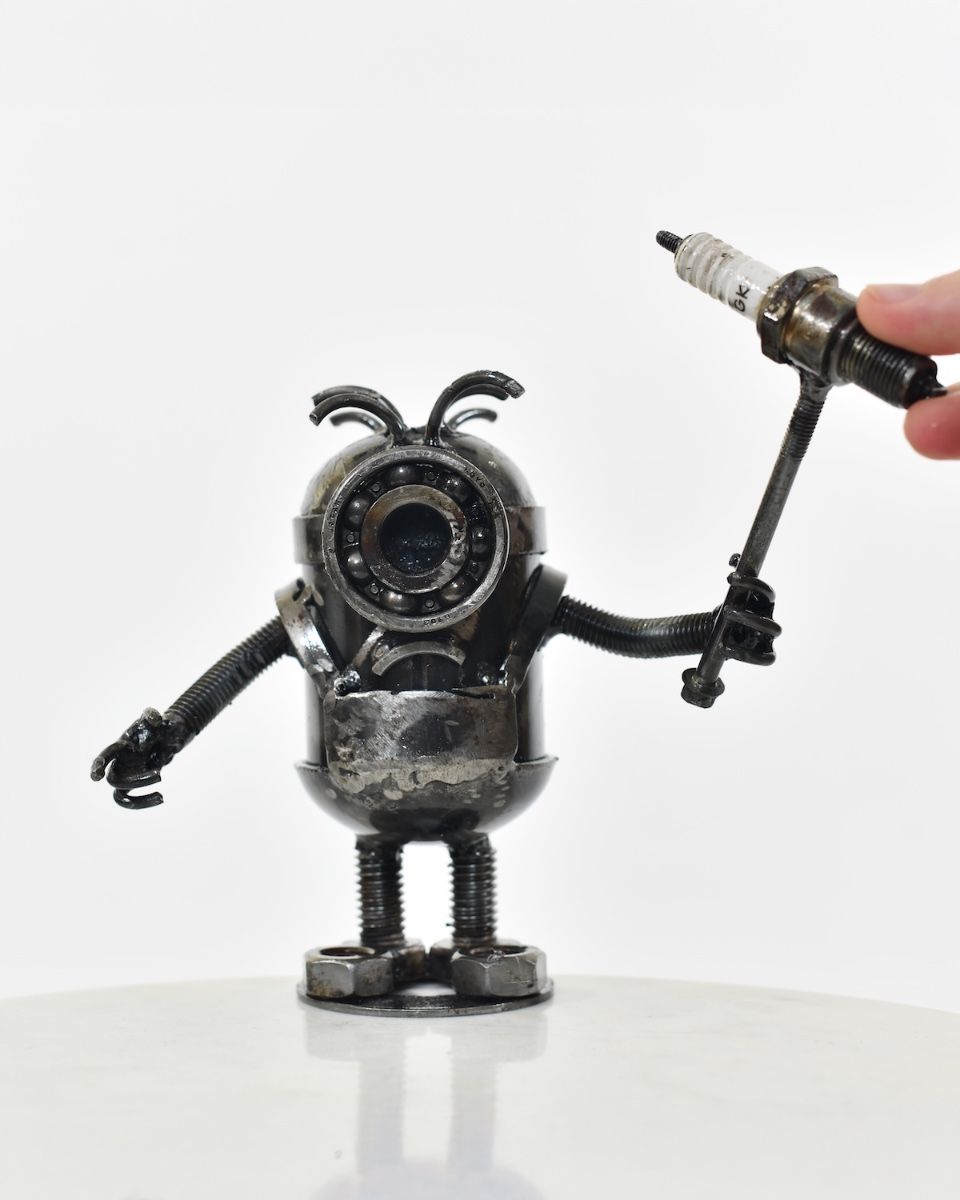 ‘Nuts’ Upcycled Metal Monster to scale with hand for reference