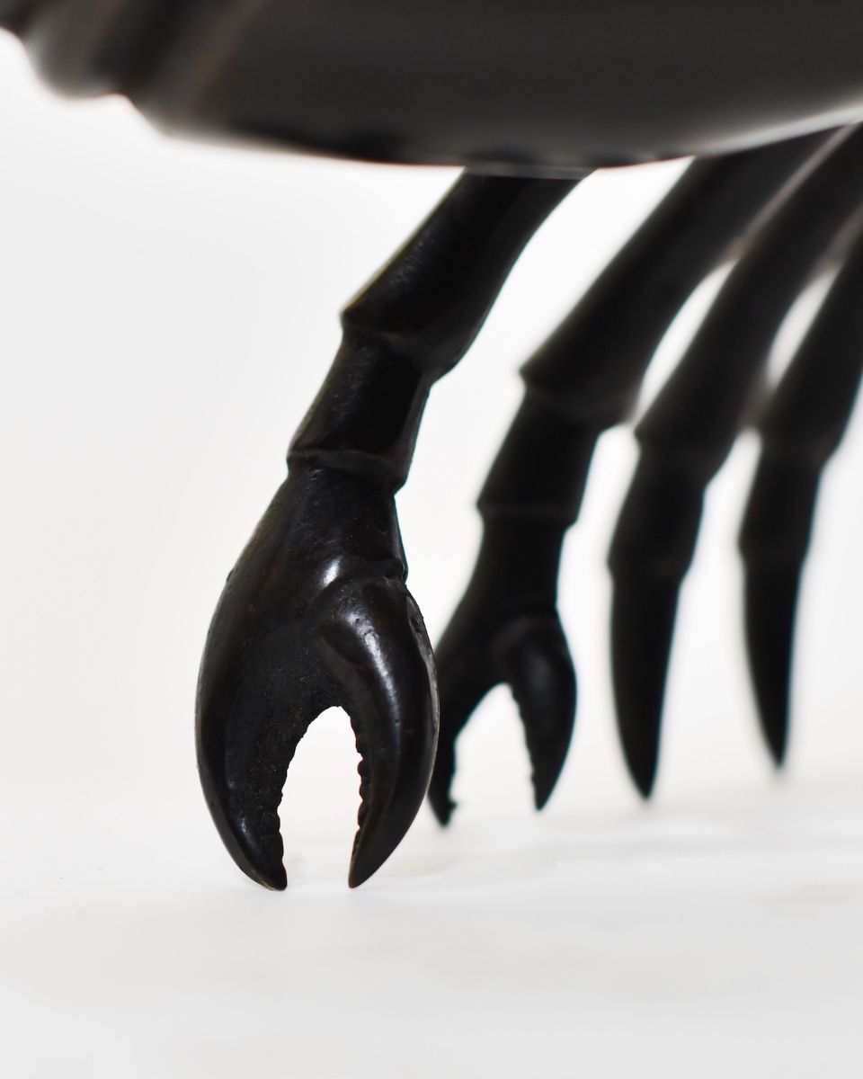 "Obsidian Tide" Lobster sculpture in Cast Brass close up of legs