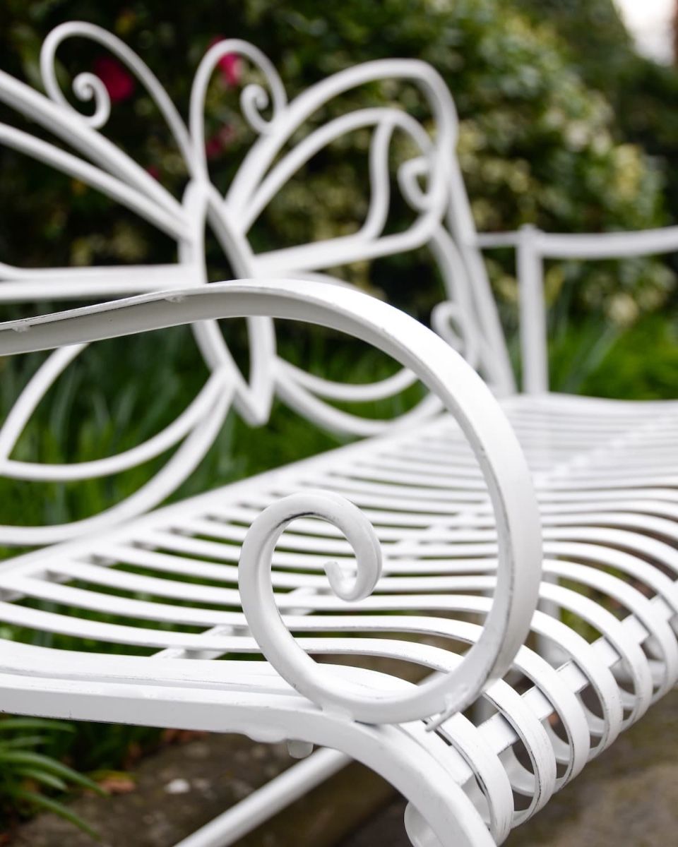 "Papillon" Contemporary Wrought Iron Two Seater Garden Bench Close up of Arm Rest