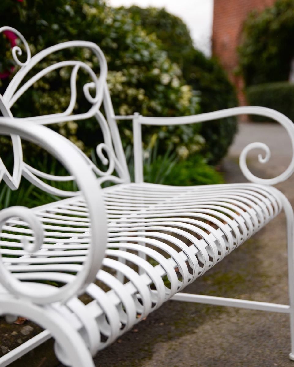 "Papillon" Contemporary Wrought Iron Two Seater Garden Bench Close up of Contoured Seat