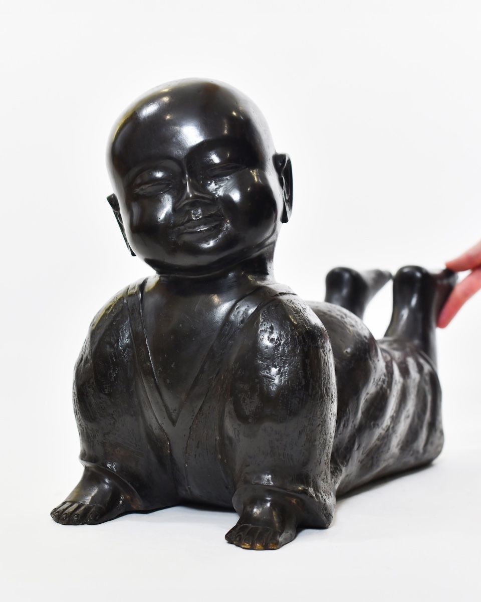 "Peaceful Cobra" Monk Yoga Ornament in Cast Brass with hand in shot for scale