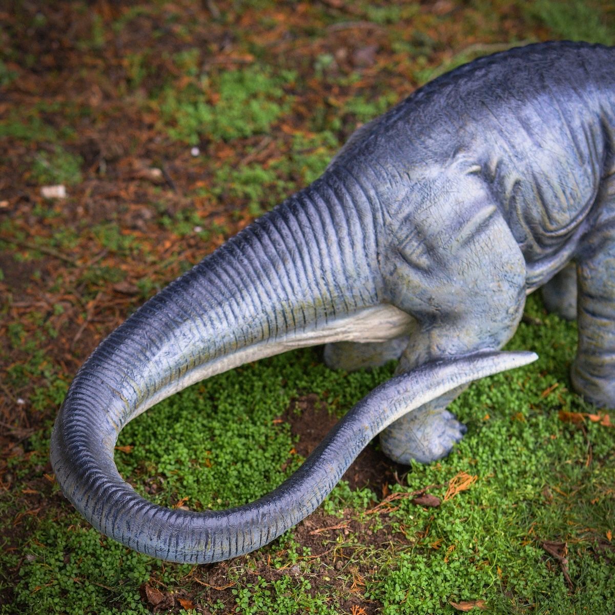 "Primeval Colossus" Diplodocus Fibreglass Garden Sculpture close up of tail