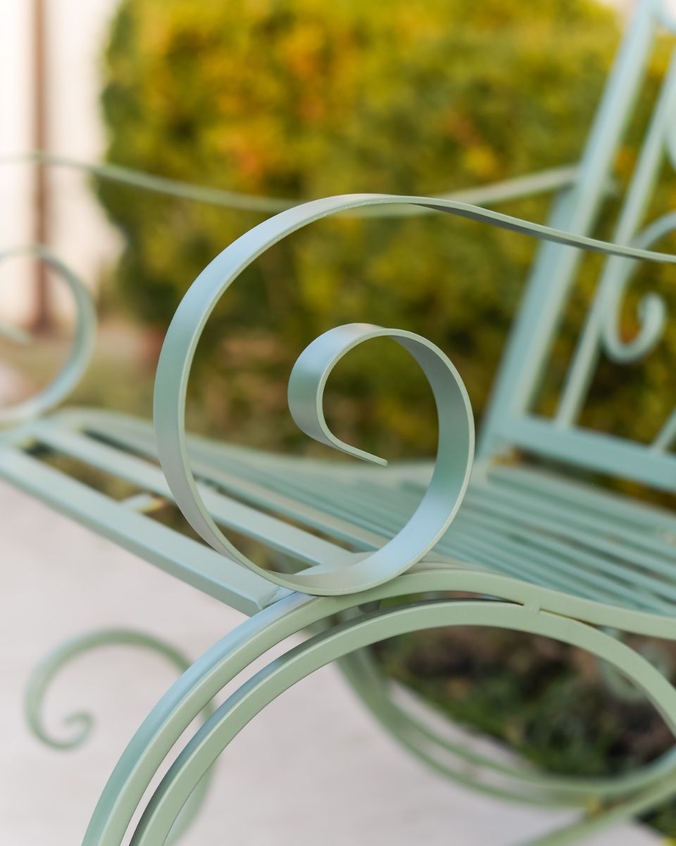 "Province" Wrought Iron Sage Green Garden Rocking Chair close up of arm rest