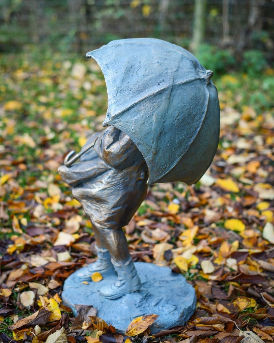 "Rain or Shine" Girl with Umbrella Resin Garden Sculpture Brass and Verdigris Finish view of umbrella