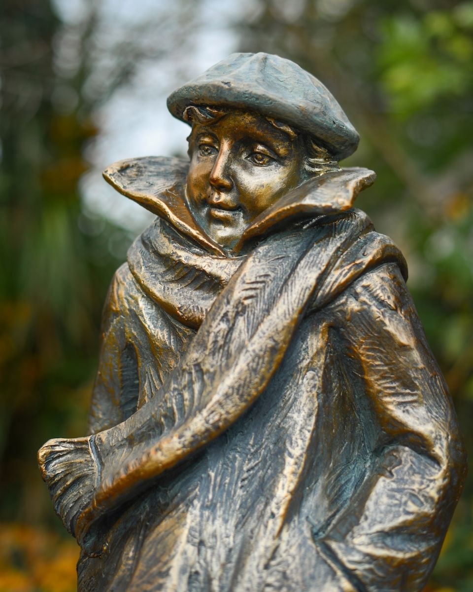 "Rain or Shine" Male Resin Garden Sculpture Brass and Verdigris Finish close up of head