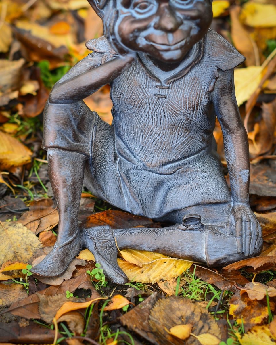 "Reminiscing Pixie" Resin Garden Sculpture Bronze and Verdigris close up of base