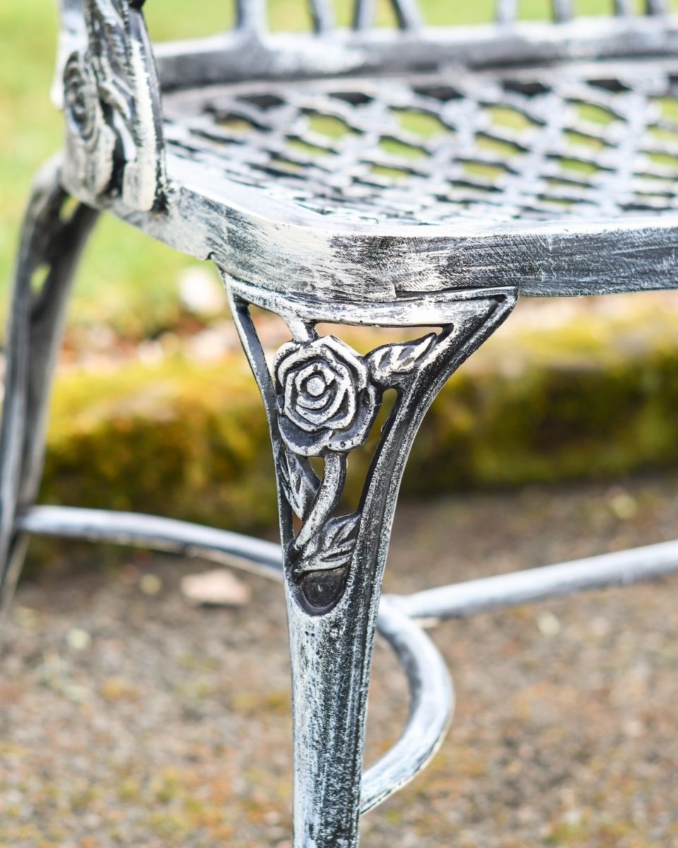 "Rosetta" Black & Silver Rose Design Bench close up of rose detailed leg support