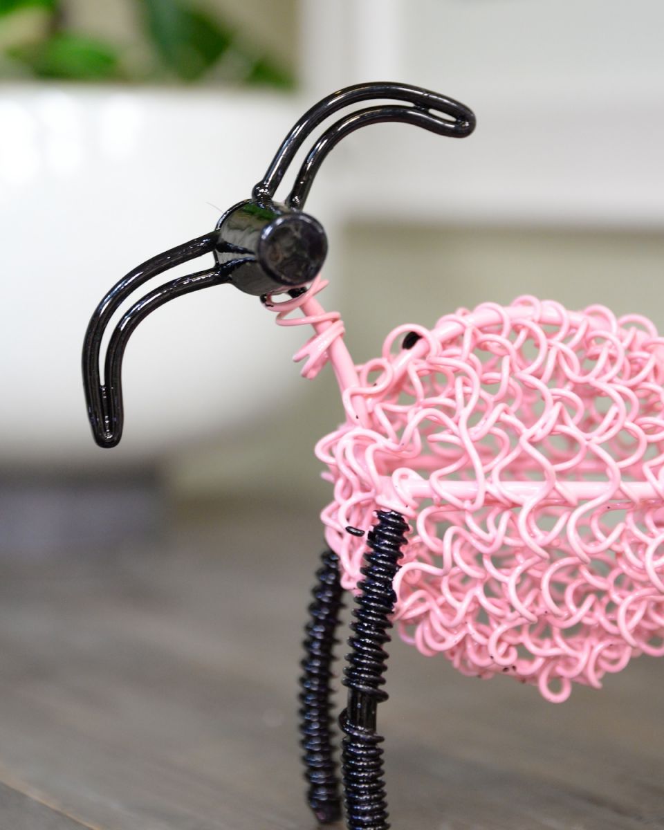 Close up of face detail on pink ram sculpture