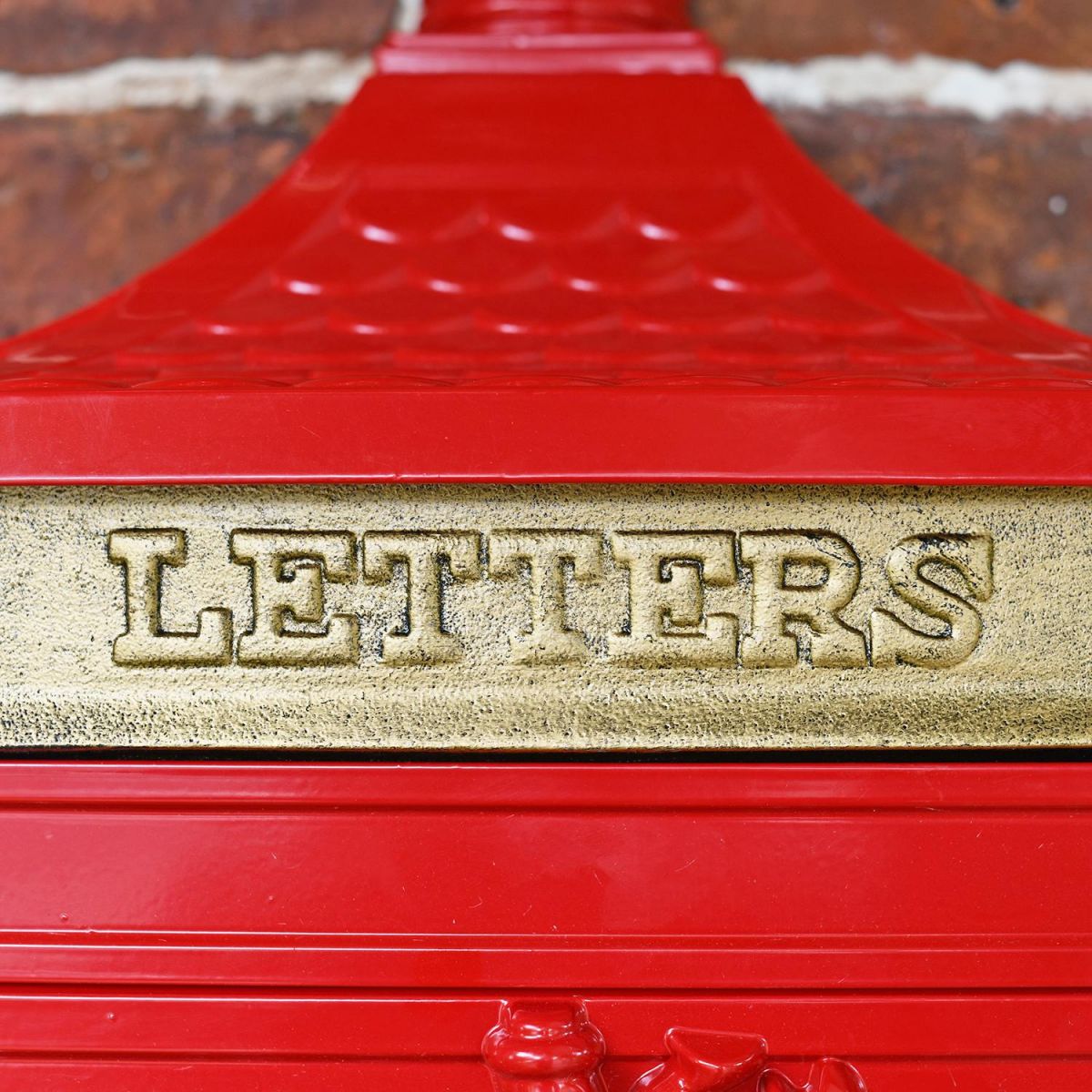 Close-up of the Brass Letter Flap on the Front of the Wall Mounted Post Box