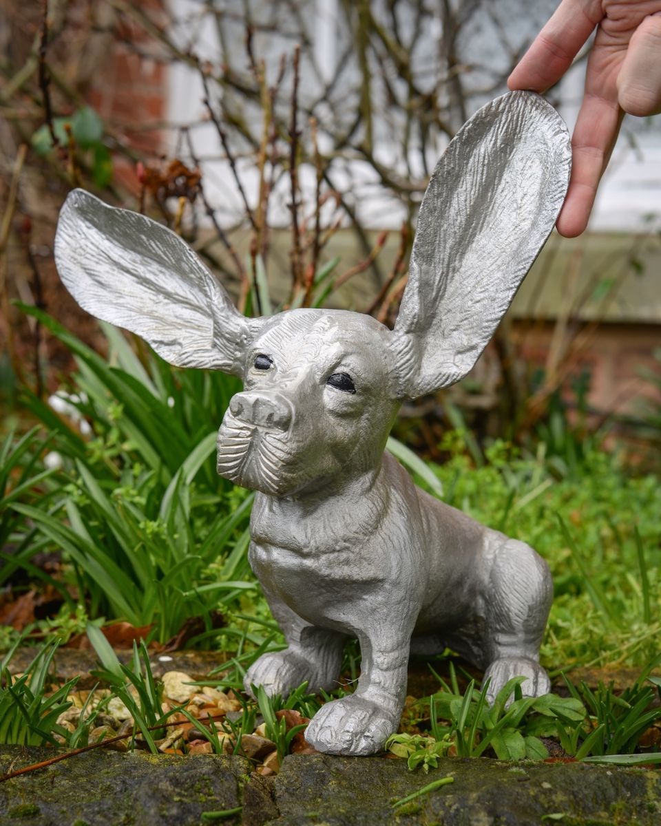 "Sid" the Bassett Hound Cast Aluminium Garden Sculpture with hand in shot for scale