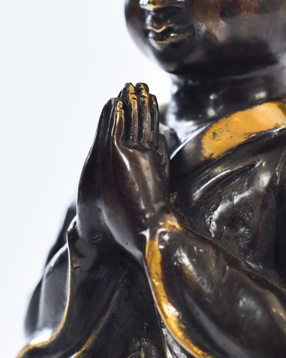"Silent Sermon" Cast Brass Buddha Sculpture close up of hands