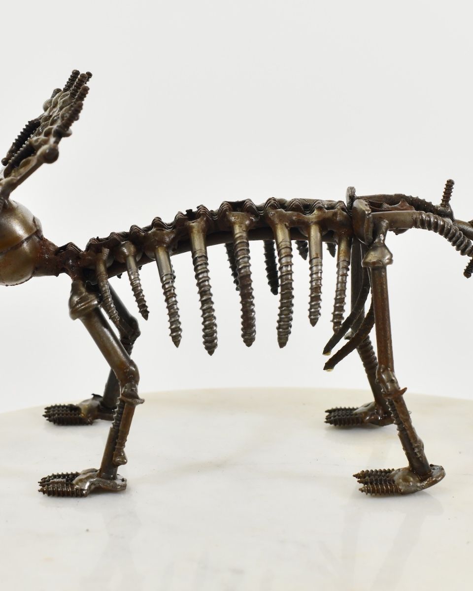 "Spike" Upcycled Metal Triceratops Ornament close up of ribs