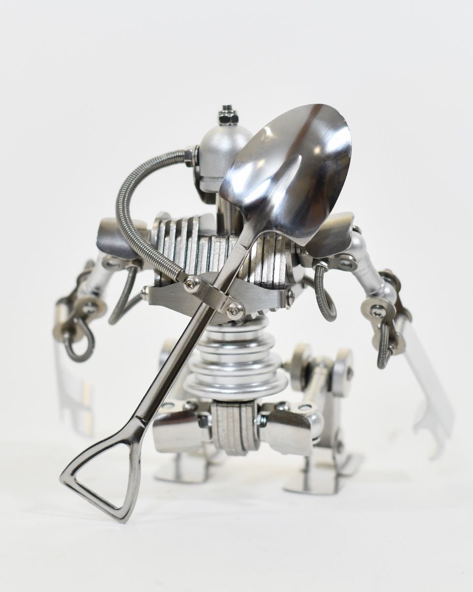 ‘Stainless Sentinel’ Upcycled Stainless Steel Robot close up of back whilst sitting