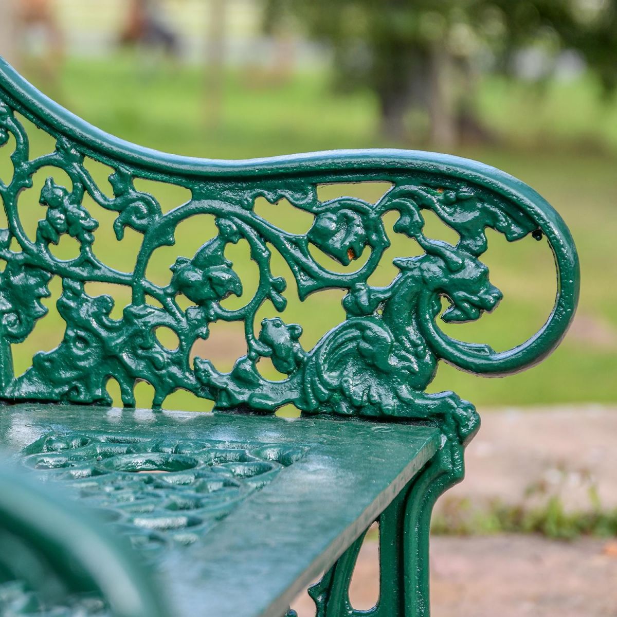 Curved Arms on the Green Cast Iron Gothic Garden Bench 