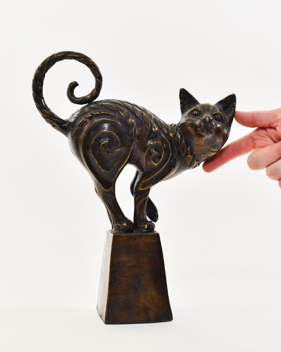 "The Curio Cat" Cast Brass Cat Sculpture with hand in shot for scale