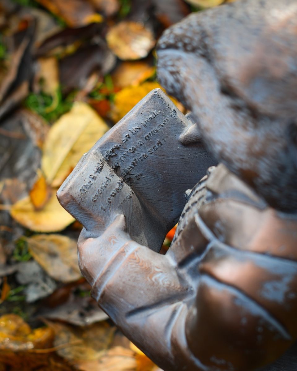 "The Hearthland Scholar" Resin Rat Garden Sculpture close up of book