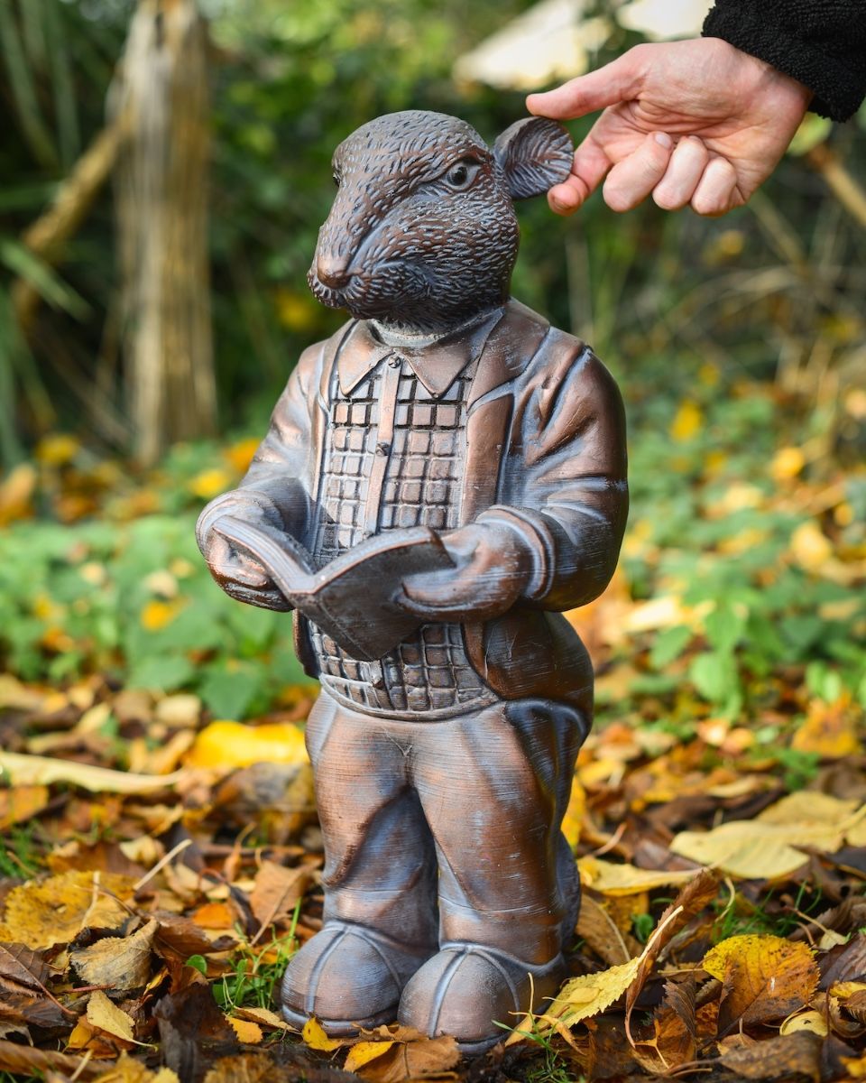 "The Hearthland Scholar" Resin Rat Garden Sculpture with hand in shot for scale