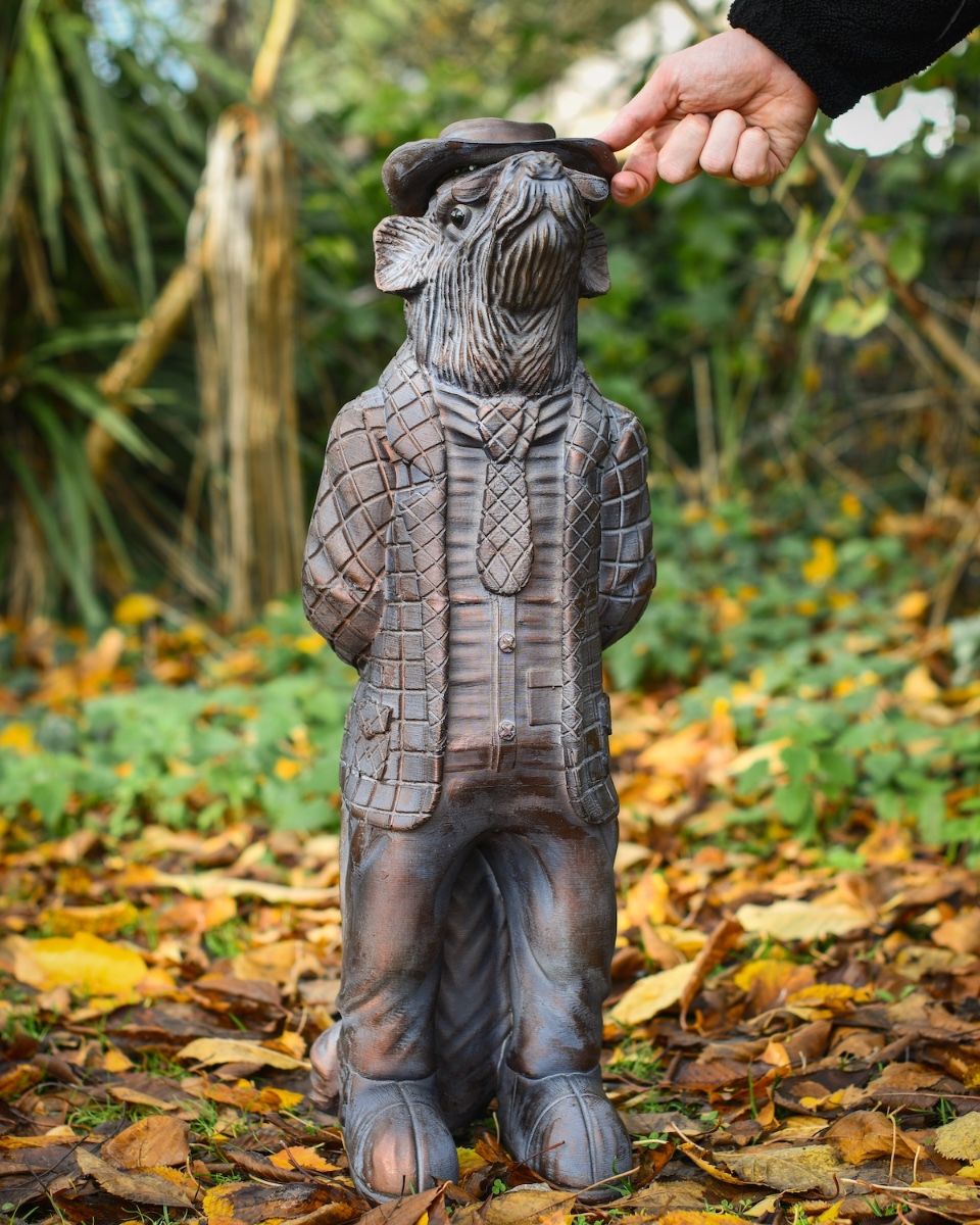 "The Hearthland Squire’ Resin Badger Garden Sculpture - Large with hand in shot for scale