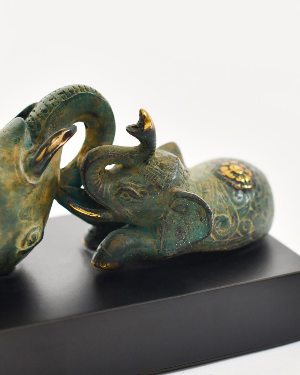 ‘The Pachyderm Pagoda" Cast Brass Elephant Ornament close up of playing elephant