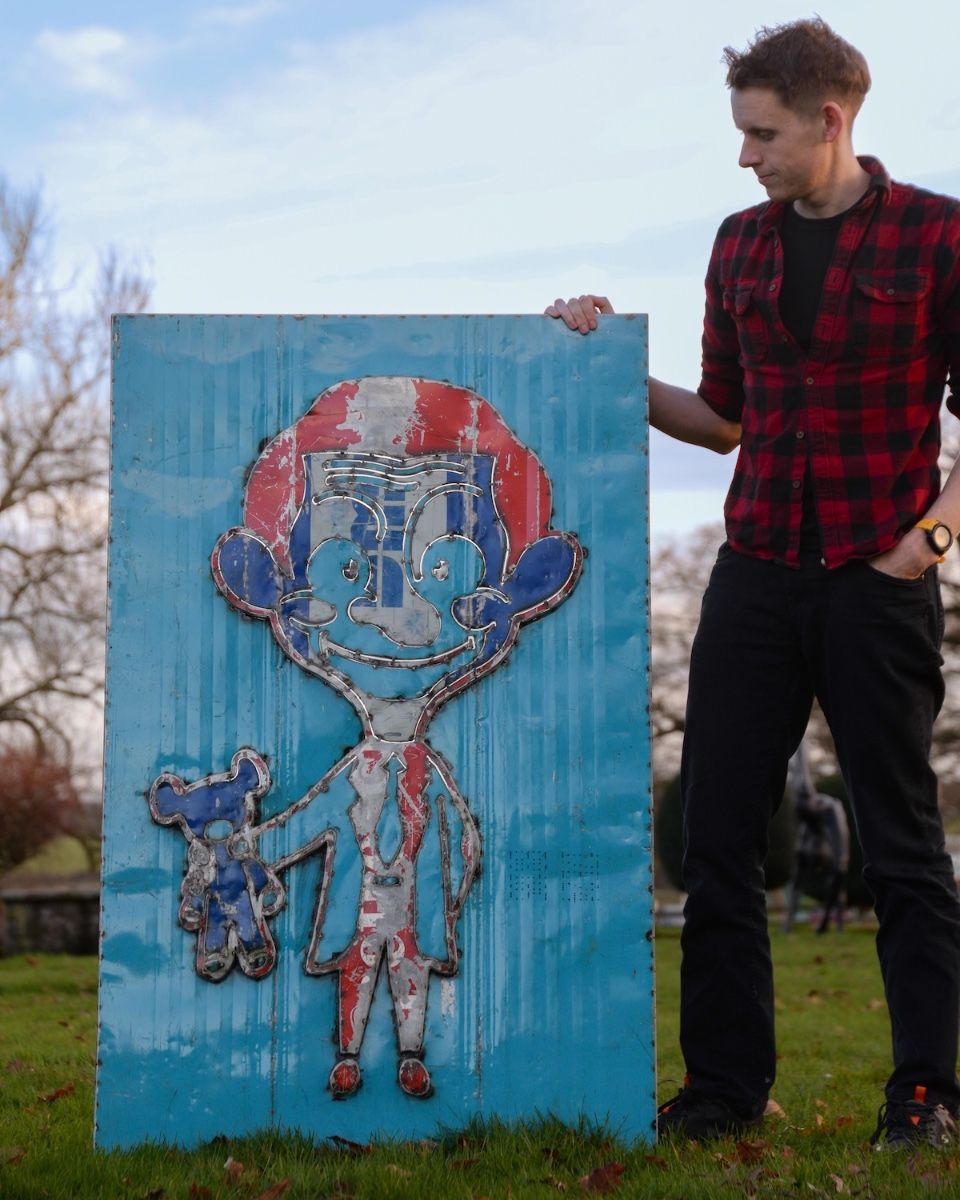 "The Silent Comedian" Oil Drum Scrap Metal Wall Art blue background