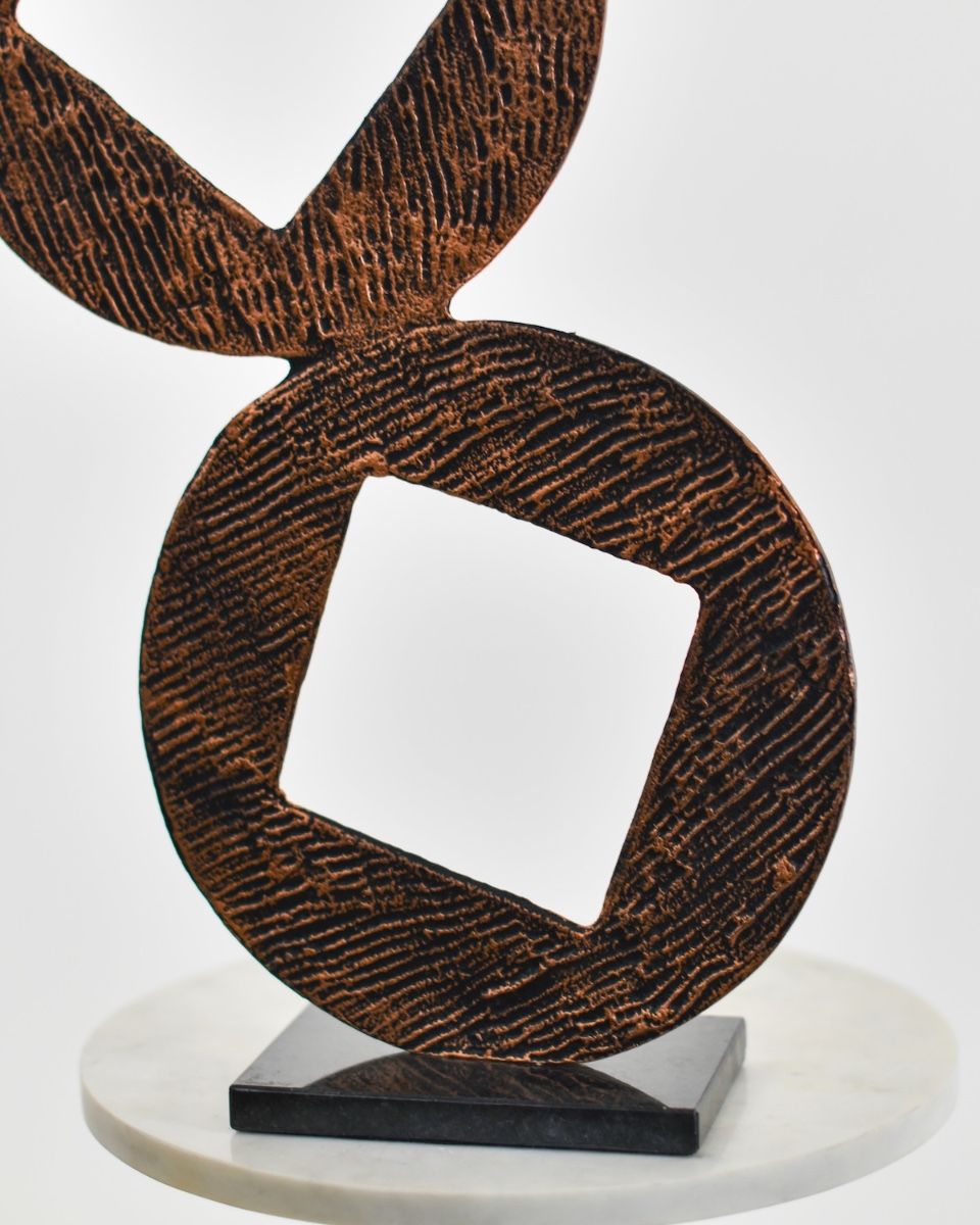 "Triple Aspect" Cast Aluminium Home Ornament - Copper close up of base