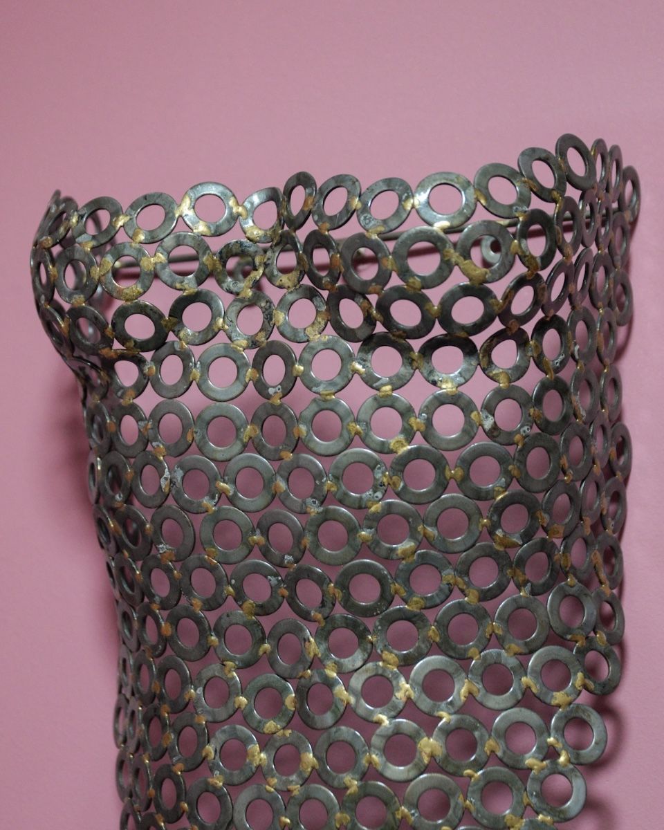 "Vesta" Female Torso Reclaimed Metal Wall Sculpture - 63cm mounted on wall close up side view