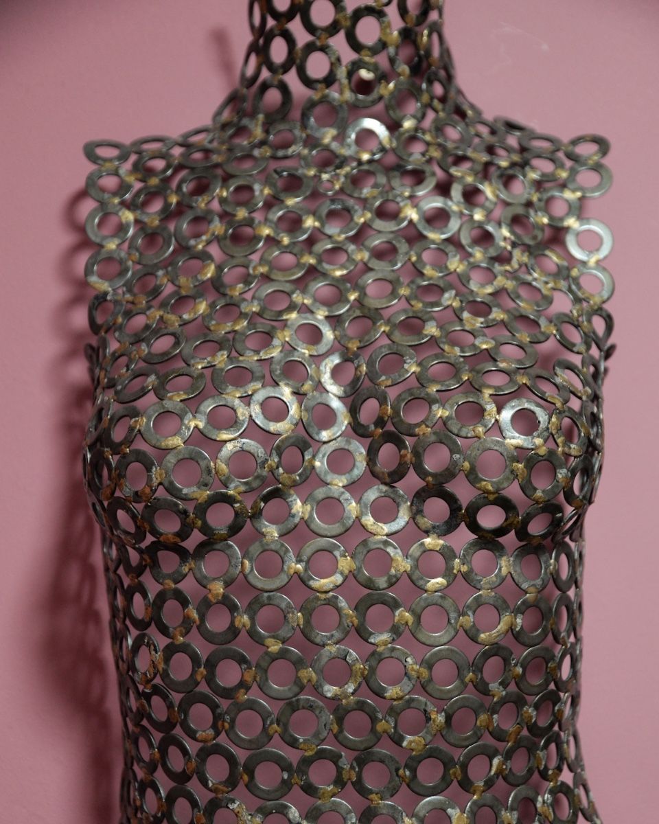"Vesta" Female Torso Reclaimed Metal Wall Sculpture mounted on wall main image close up front view