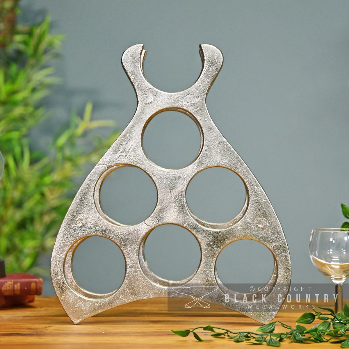 7 Bottle Wine Rack Sitting on a Counter