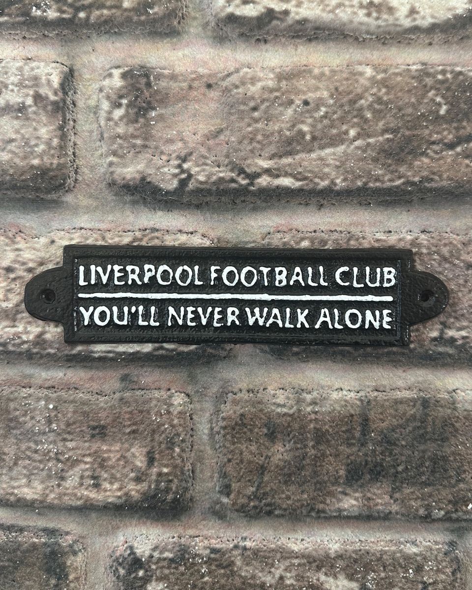 "You"ll Never Walk Alone" Football Club Traditional Cast Iron Wall Sign mounted on brick wall
