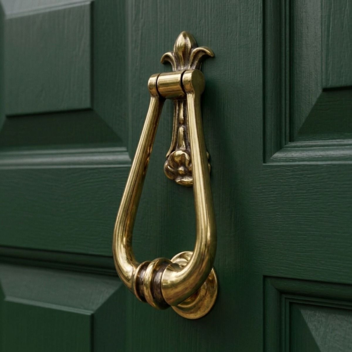 A Close up of the Aged Brass Traditional Loop Handle Door Knocker on the Front of a Green Door - Digital Illustration