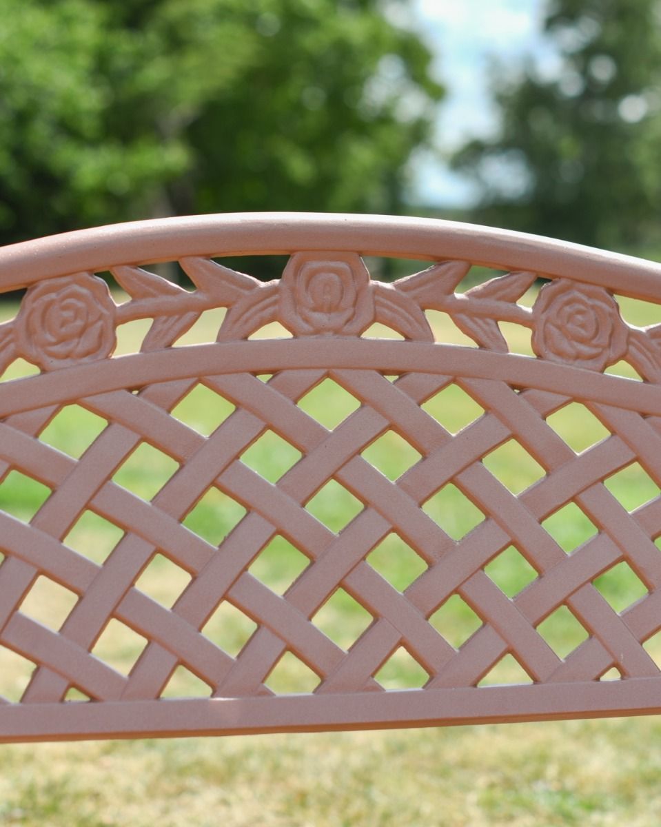 A close up View of the Lattice Backrest of the Antique Pink "Thorpe" Two Seater Garden Bench 